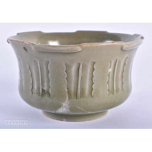 45D - AN UNUSUAL CHINESE QING DYNASTY CELADON BOWL incised with calligraphy. 8cm x 13.5 cm