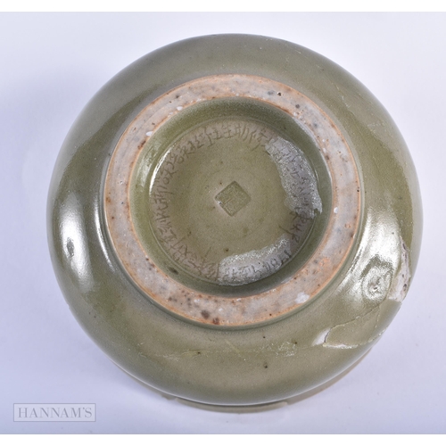 45D - AN UNUSUAL CHINESE QING DYNASTY CELADON BOWL incised with calligraphy. 8cm x 13.5 cm