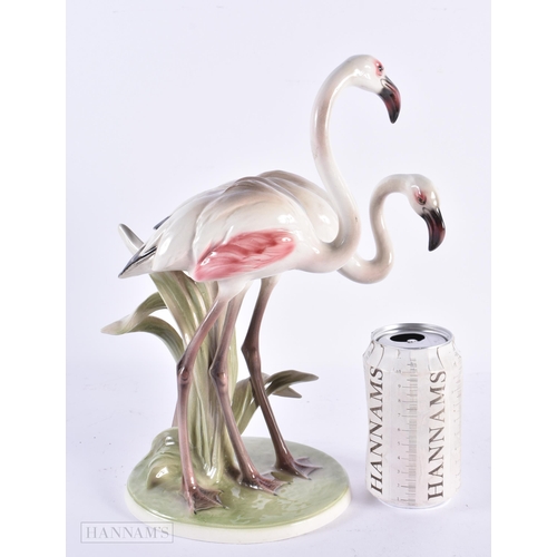 461 - AN ART DECO AUSTRIAN VIENNA KERAMOS CERAMIC FIGURE OF FLAMINGOS. 31 cm high.