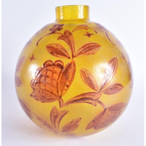 482 - AN UNUSUAL EARLY 20TH EUROPEAN YELLOW GLASS BULBOUS VASE decorated with red foliage. 22 cm x 17 cm.