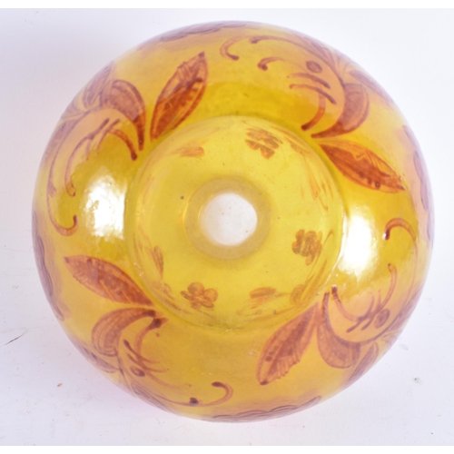 482 - AN UNUSUAL EARLY 20TH EUROPEAN YELLOW GLASS BULBOUS VASE decorated with red foliage. 22 cm x 17 cm.