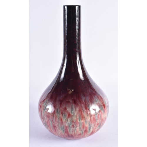 507 - A CHINESE STYLE FLAMBE GLAZED CONTINENTAL VASE. 36 cm x 18 cm.