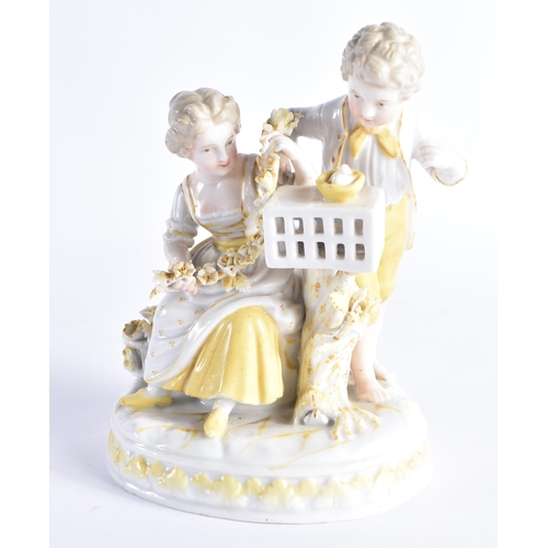 510 - A GERMAN RUDOLPSTADT PORCELAIN FIGURAL GROUP. 15 cm x 11 cm.