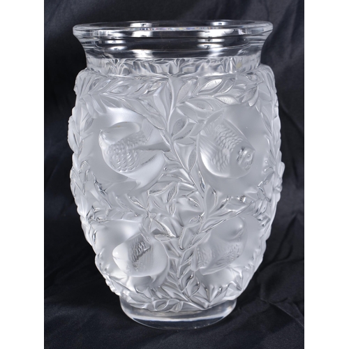 511 - A LALIQUE GLASS BIRD VASE. 17 cm x 11 cm.