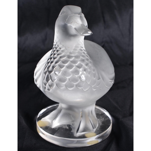 512 - A LALIQUE GLASS DUCK. 13 cm wide.