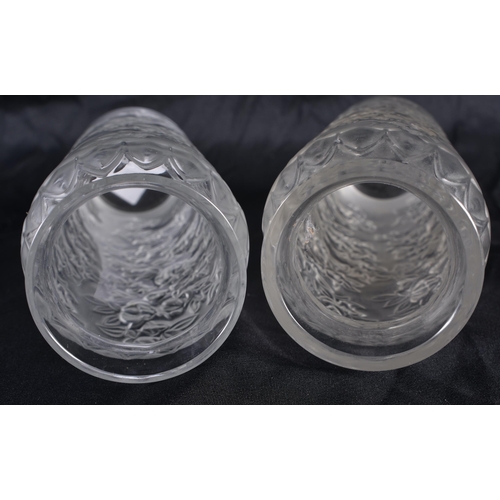 516 - A PAIR OF LALIQUE GLASS VASES. 18 cm high.