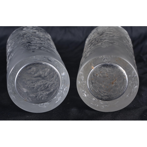 516 - A PAIR OF LALIQUE GLASS VASES. 18 cm high.