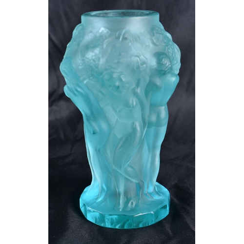 518 - A CZECH BLUE GLASS NUDE WOMEN VASE. 13 cm high.