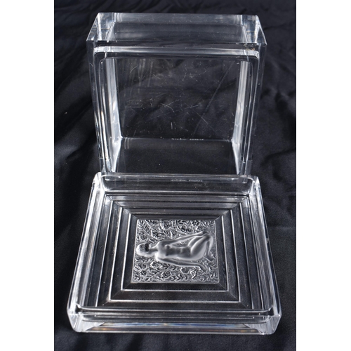 519 - A LALIQUE SQUARE FORM GLASS MAIDEN BOX AND COVER. 9.5 cm square.