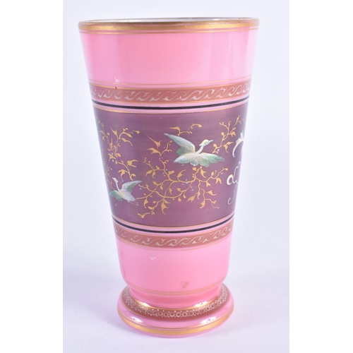 52 - A 19TH CENTURY ENAMELLED PINK OPALINE GLASS BEAKER painted in relief with mythical birds. 15 cm high... 