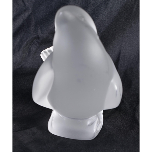 522 - A LALIQUE GLASS BIRD. 9 cm x 10 cm.