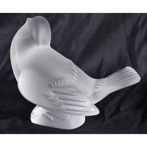 522 - A LALIQUE GLASS BIRD. 9 cm x 10 cm.