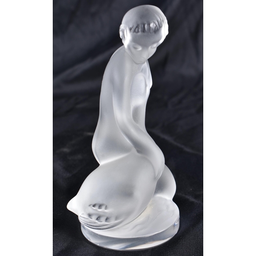 525 - A LALIQUE GLASS NUDE FEMALE. 12 cm high.