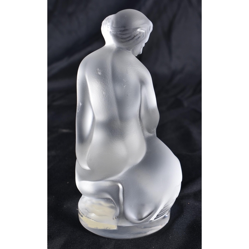 525 - A LALIQUE GLASS NUDE FEMALE. 12 cm high.