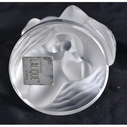 525 - A LALIQUE GLASS NUDE FEMALE. 12 cm high.