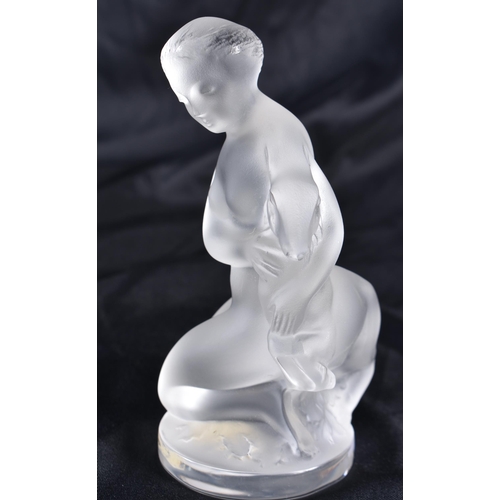 526 - A LALIQUE GLASS NUDE FEMALE. 12 cm high.