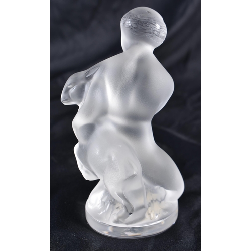 526 - A LALIQUE GLASS NUDE FEMALE. 12 cm high.