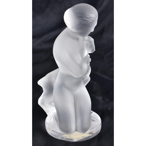 526 - A LALIQUE GLASS NUDE FEMALE. 12 cm high.