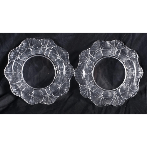 527 - A PAIR OF LALIQUE GLASS DISHES. 14 cm wide.