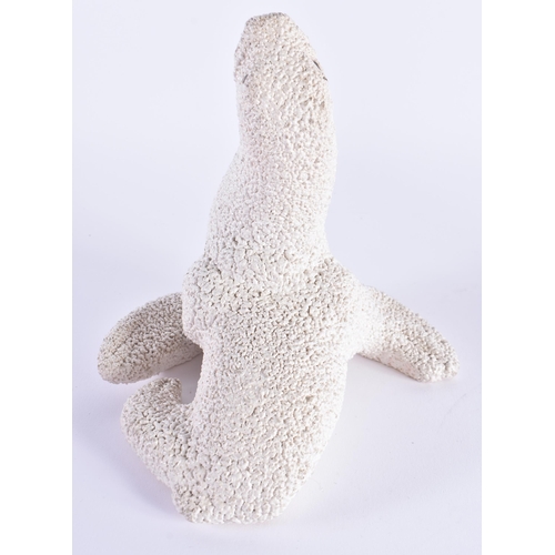 53 - A RARE PLICHTA LONDON CERAMIC ENCRUSTED SEA LION. 18 cm x 10 cm.