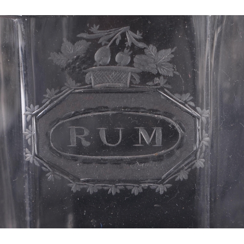 542 - A PAIR OF REGENCY CUT GLASS RUM AND WHISKEY DECANTERS. 22 cm high.