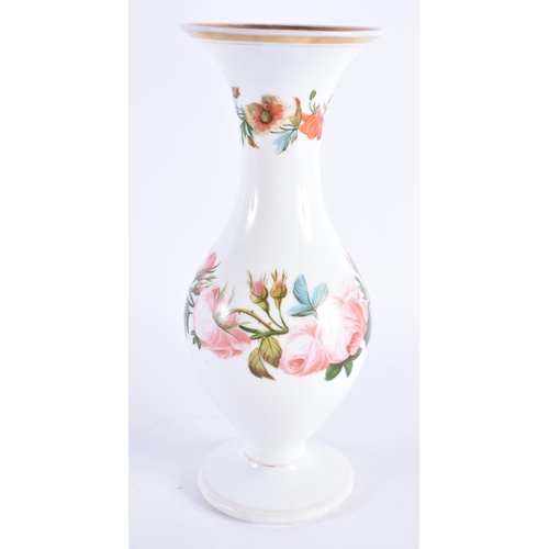 58 - A VICTORIAN ENAMELLED OPALINE GLASS VASE painted with bold foliage. 27 cm high.