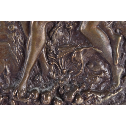 596 - AN ANTIQUE BRONZE FRENCH BRONZE REPOUSSE PLAQUE. 23.5 cm diameter.