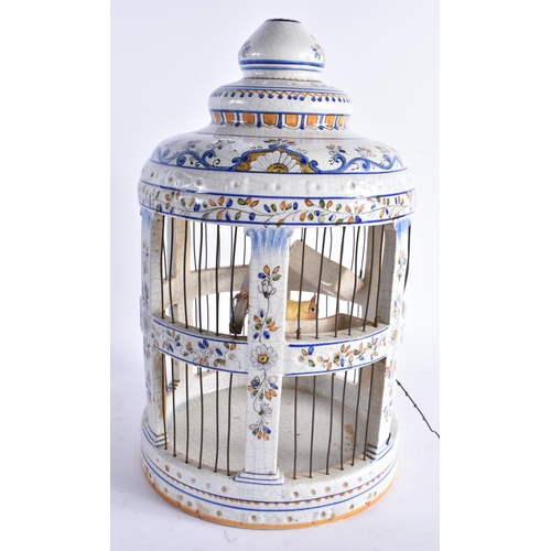 599 - A LARGE ITALIAN FAIENCE POTTERY BIRD CAGE. 38 cm high.