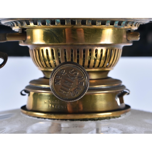 611 - A HUGE LATE VICTORIAN/EDWARDIAN COUNTRY HOUSE OIL LAMP formed as a corinthian column. 98 cm high.