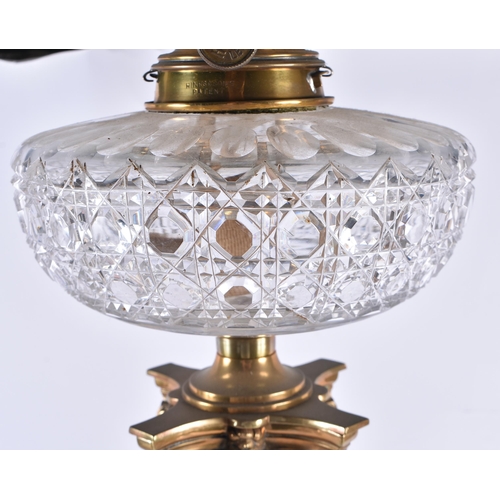 611 - A HUGE LATE VICTORIAN/EDWARDIAN COUNTRY HOUSE OIL LAMP formed as a corinthian column. 98 cm high.