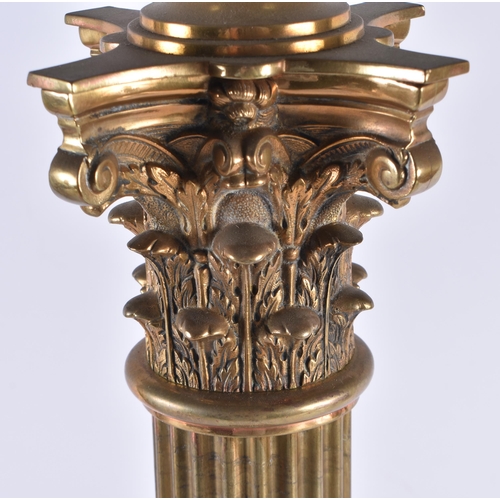 611 - A HUGE LATE VICTORIAN/EDWARDIAN COUNTRY HOUSE OIL LAMP formed as a corinthian column. 98 cm high.