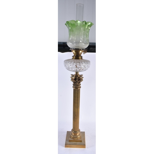 611 - A HUGE LATE VICTORIAN/EDWARDIAN COUNTRY HOUSE OIL LAMP formed as a corinthian column. 98 cm high.