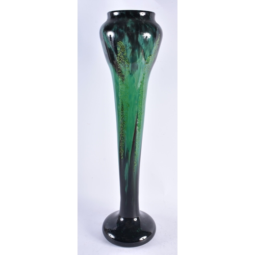 617 - A VERY LARGE FRENCH DAUM NANCY GREEN GLASS VASE of organic scrolling form. 59 cm high.