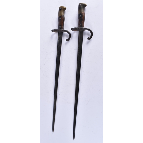 618 - TWO ANTIQUE MILITARY BAYONETS. 64 cm long. (2)