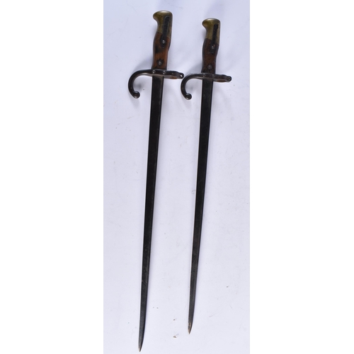 618 - TWO ANTIQUE MILITARY BAYONETS. 64 cm long. (2)