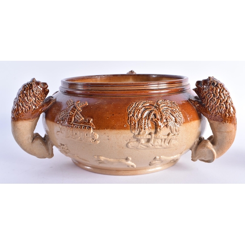 62 - A VERY UNUSUAL MID 19TH CENTURY ENGLISH STONEWARE TRI HANDLED BOWL with lions handles, decorated wit... 