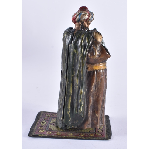 621 - AN AUSTRIAN COLD PAINTED BRONZE EROTIC FIGURE modelled as an Arabic male with a cat. 11 cm high.