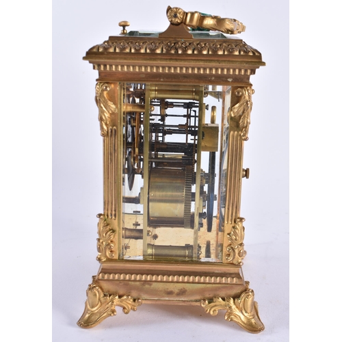 629 - A GOOD ANTIQUE FRENCH REPEATING BRONZE CARRIAGE CLOCK with painted enamel dial. 20 cm high inc handl... 