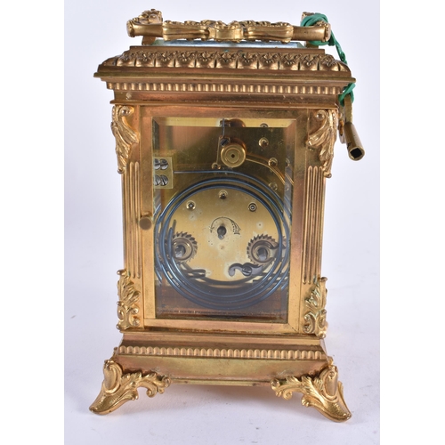 629 - A GOOD ANTIQUE FRENCH REPEATING BRONZE CARRIAGE CLOCK with painted enamel dial. 20 cm high inc handl... 