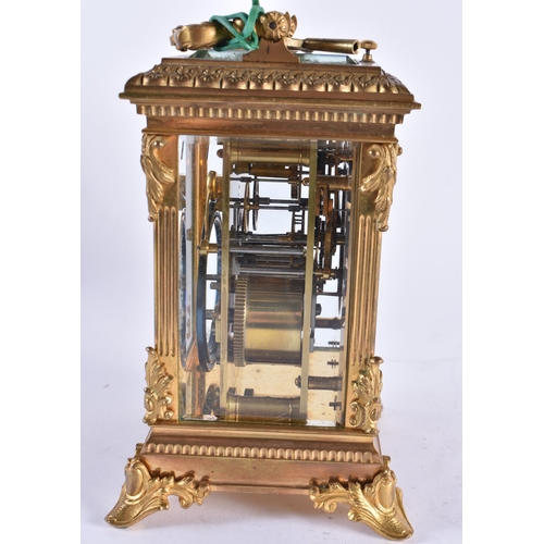 629 - A GOOD ANTIQUE FRENCH REPEATING BRONZE CARRIAGE CLOCK with painted enamel dial. 20 cm high inc handl... 