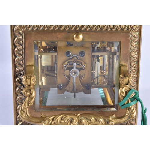 629 - A GOOD ANTIQUE FRENCH REPEATING BRONZE CARRIAGE CLOCK with painted enamel dial. 20 cm high inc handl... 