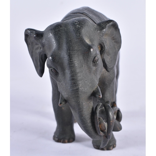 637 - A 19TH CENTURY EUROPEAN BRONZE ELEPHANT INKWELL. 15 cm wide.