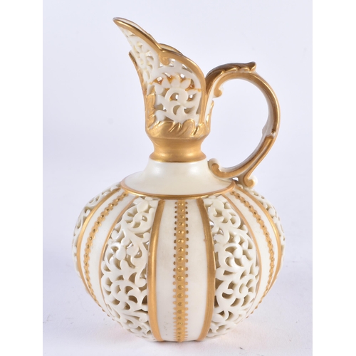 638 - A ROYAL WORCESTER RETICULATED PORCELAIN JUG. 13.5 cm high.