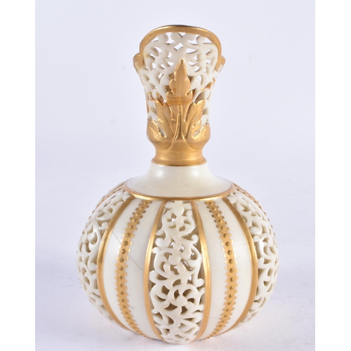 638 - A ROYAL WORCESTER RETICULATED PORCELAIN JUG. 13.5 cm high.