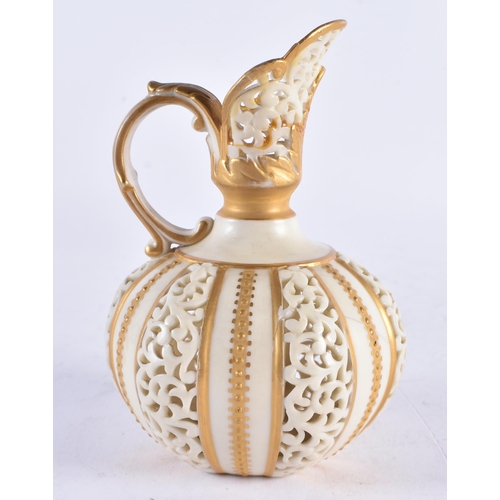 638 - A ROYAL WORCESTER RETICULATED PORCELAIN JUG. 13.5 cm high.