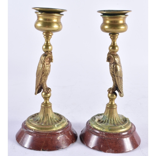 640 - A PAIR OF 19TH CENTURY BRONZE AND MARBLE OWL CANDLESTICKS. 15 cm high.