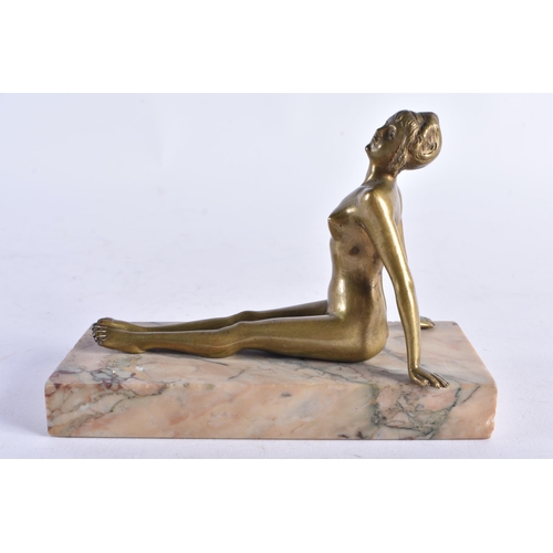 642 - AN ART DECO BRONZE AND MARBLE RECLINING NUDE FIGURE OF A FEMALE. 12 cm wide.