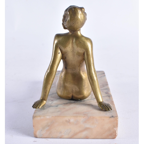 642 - AN ART DECO BRONZE AND MARBLE RECLINING NUDE FIGURE OF A FEMALE. 12 cm wide.