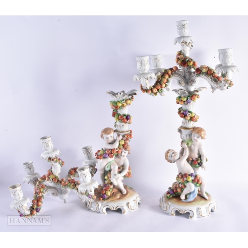 670 - A LARGE PAIR OF CZECH PORCELAIN FIGURAL CANDLEABRA. 54 cm x 27 cm.