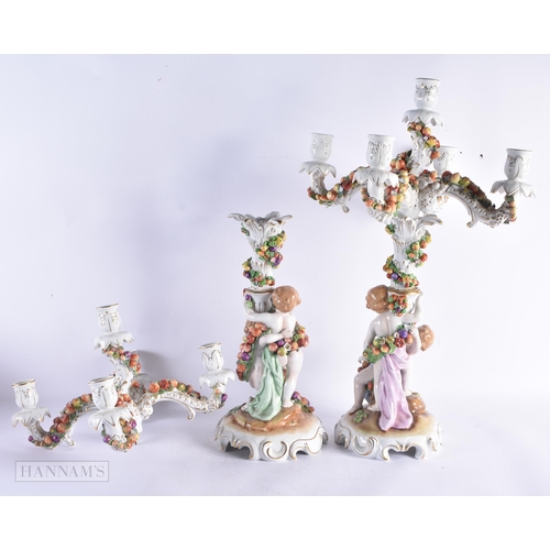 670 - A LARGE PAIR OF CZECH PORCELAIN FIGURAL CANDLEABRA. 54 cm x 27 cm.